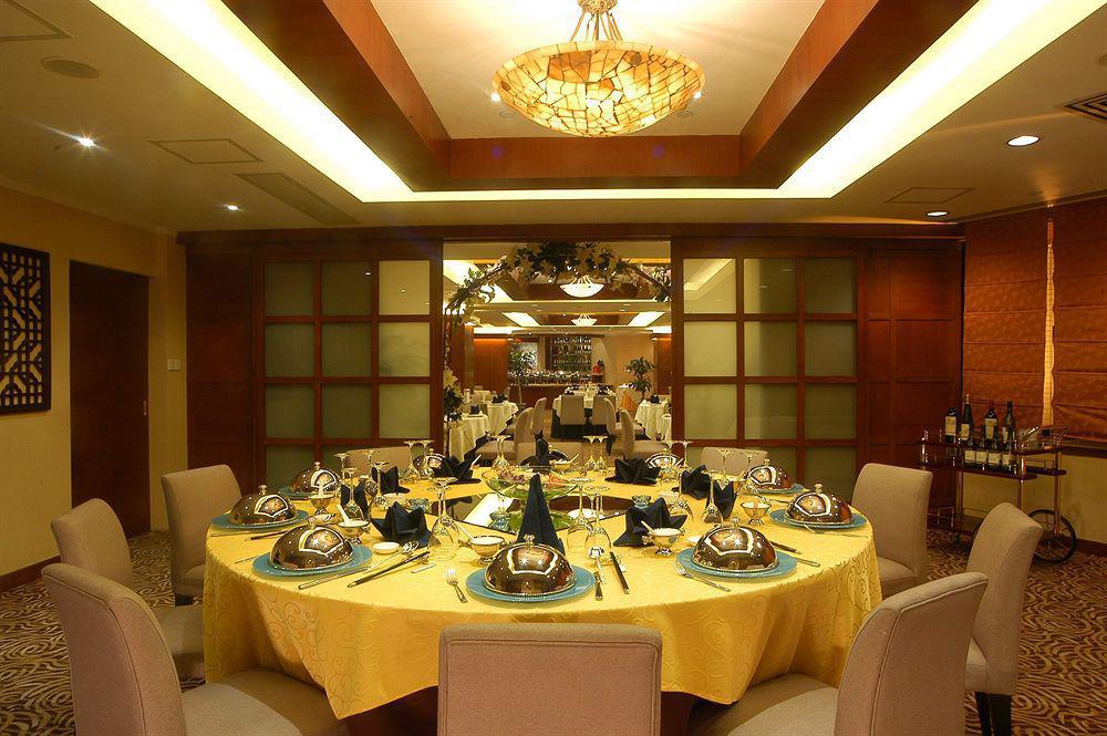 فندق شانغهايفي  فندق مدينة شنغهاي المطعم الصورة